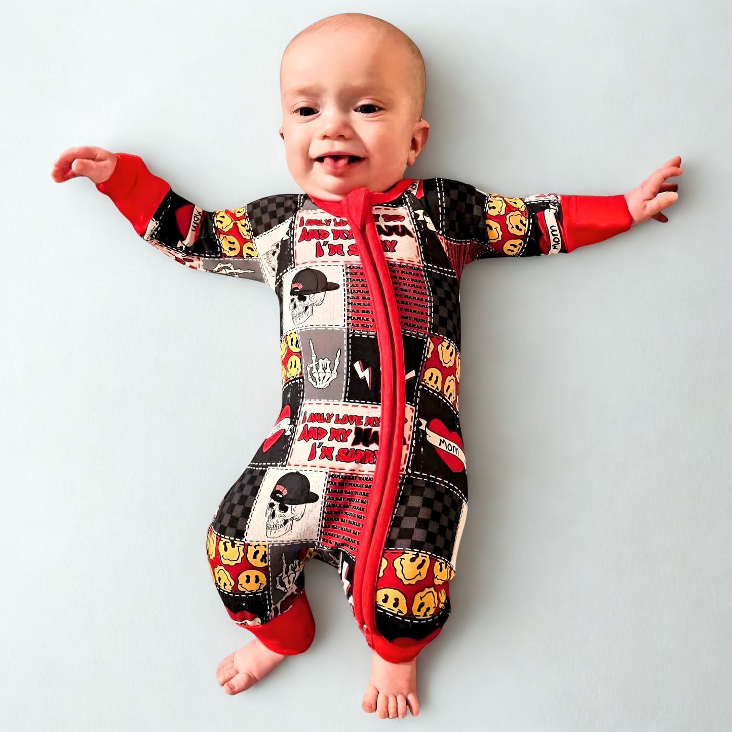 Mama's Boy Bamboo Romper with colorful patchwork design, featuring double-sided zipper.